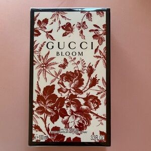 Gucci Bloom Fragrance with Red Floral Design